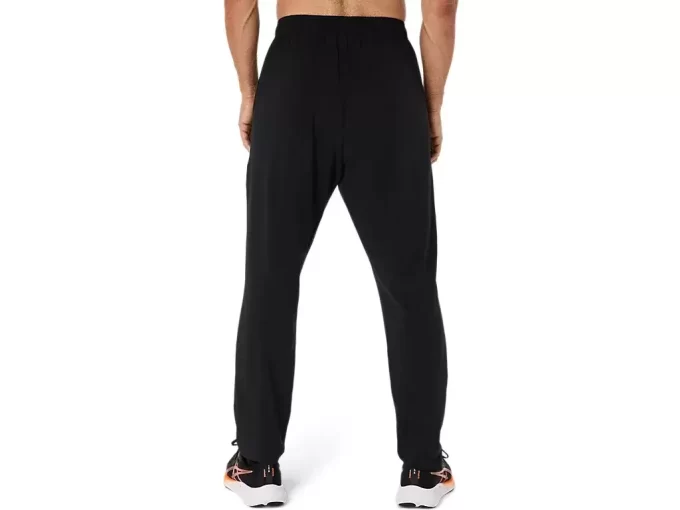 Calça de tecido ASICS com bordado espiral Calça de tecido ASICS com bordado espiral