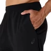 Calça de tecido ASICS com bordado espiral Calça de tecido ASICS com bordado espiral