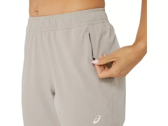 Calça feminina de treino com elasticidade no tronco Calça feminina de treino com elasticidade no tronco